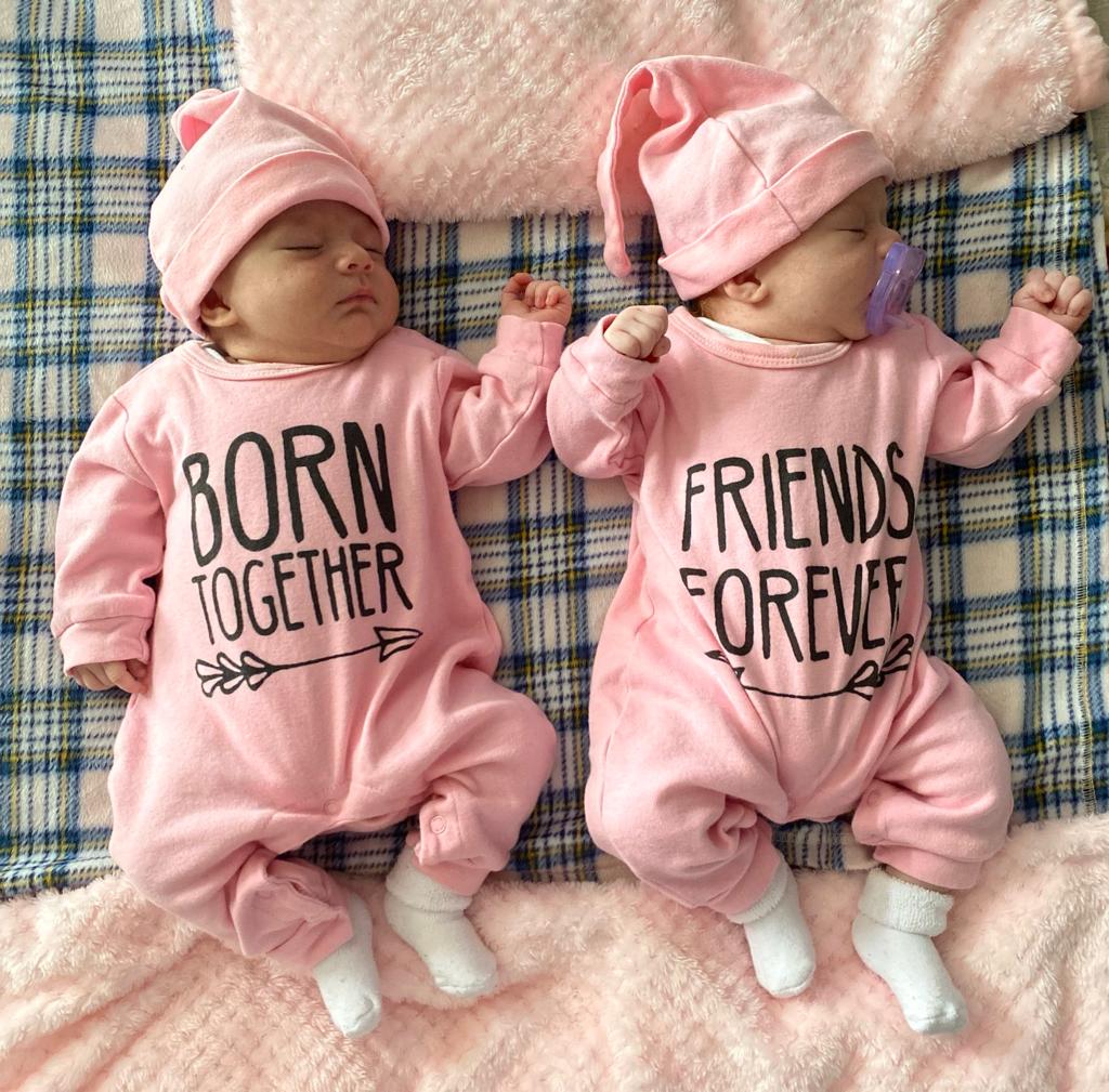 Twins in pink dresses sleeping at infant care in tuscon daycare